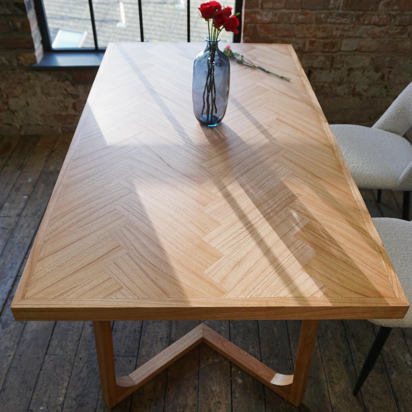 Hersman Solid Mindi Wood Dining Table